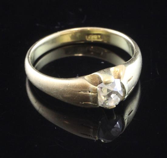 An 18ct gold and claw set solitaire diamond ring, size Q.